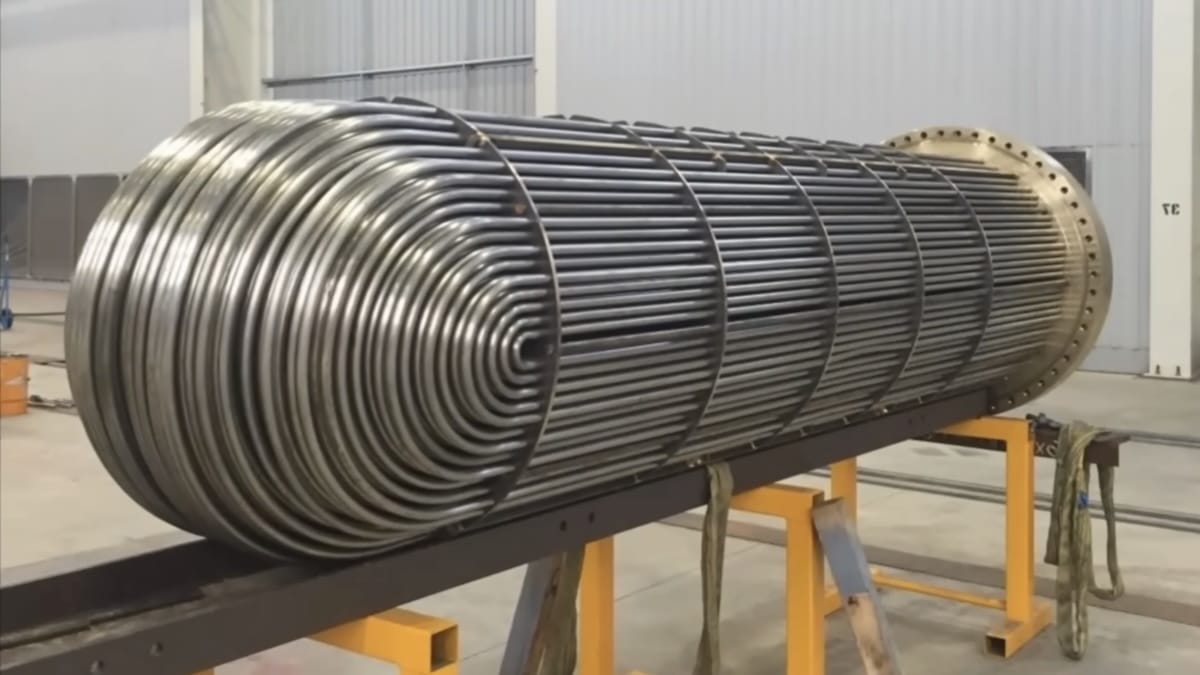 Shell and tube heat exchanger used for industrial process heating and cooling applications